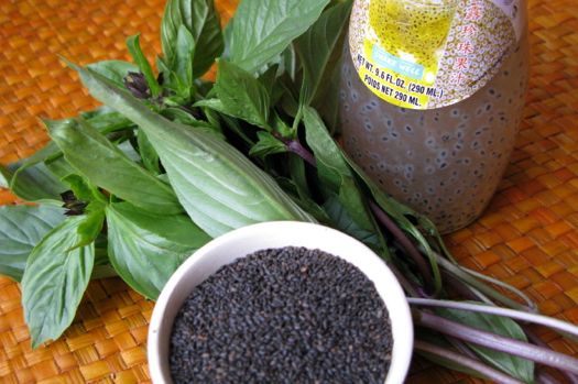 Photo: Fresh holy basil, basil seeds, and bottled basil drink with honey from a Thai grocery. Credit: Sarah Khan.
